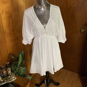 C’isa white eyelet lace dress .